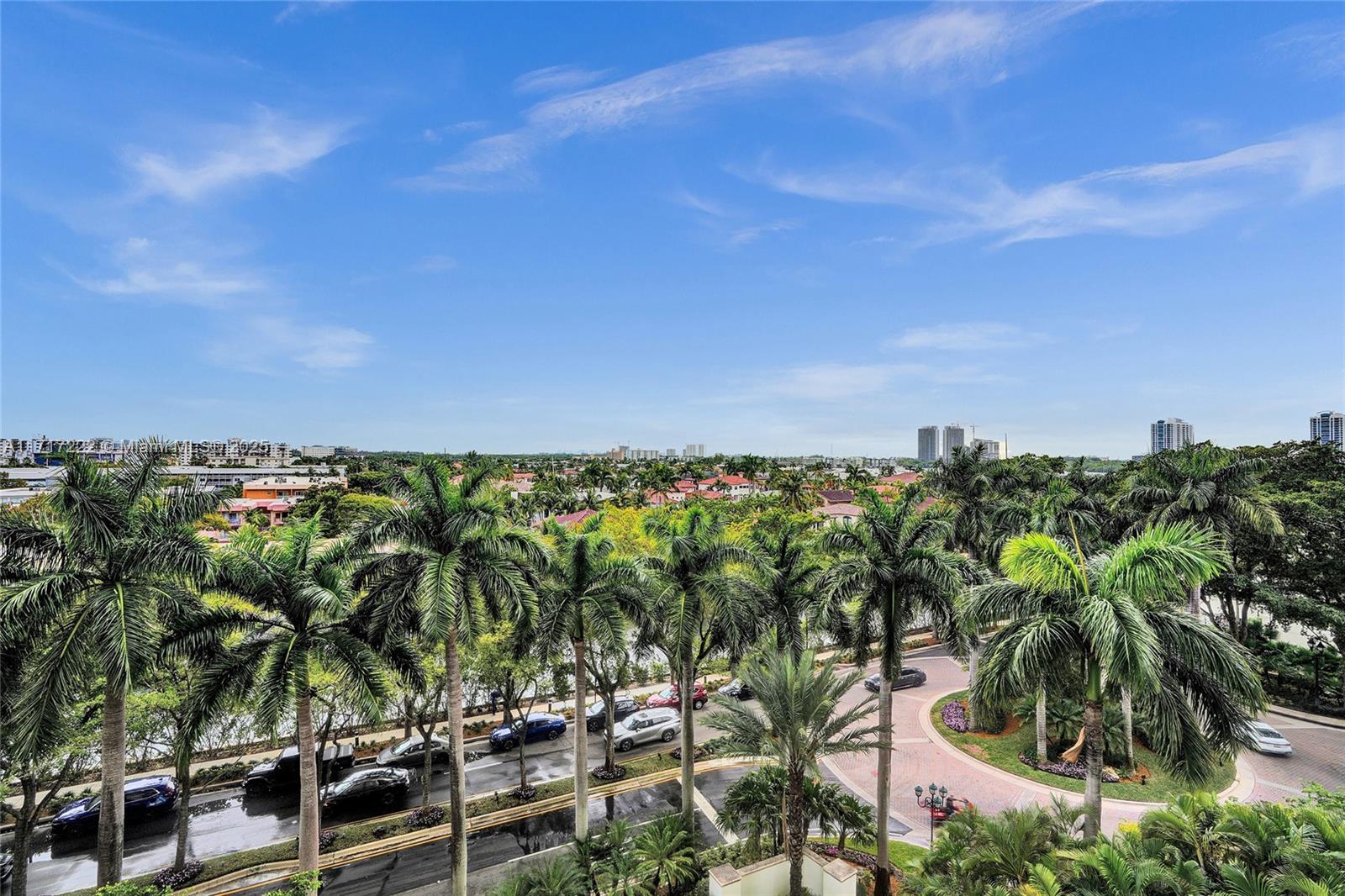 2000 Island Boulevard, Unit 608 Aventura, FL 33160 - Photo 32 of 38 a view of a yard and tree in front of it
