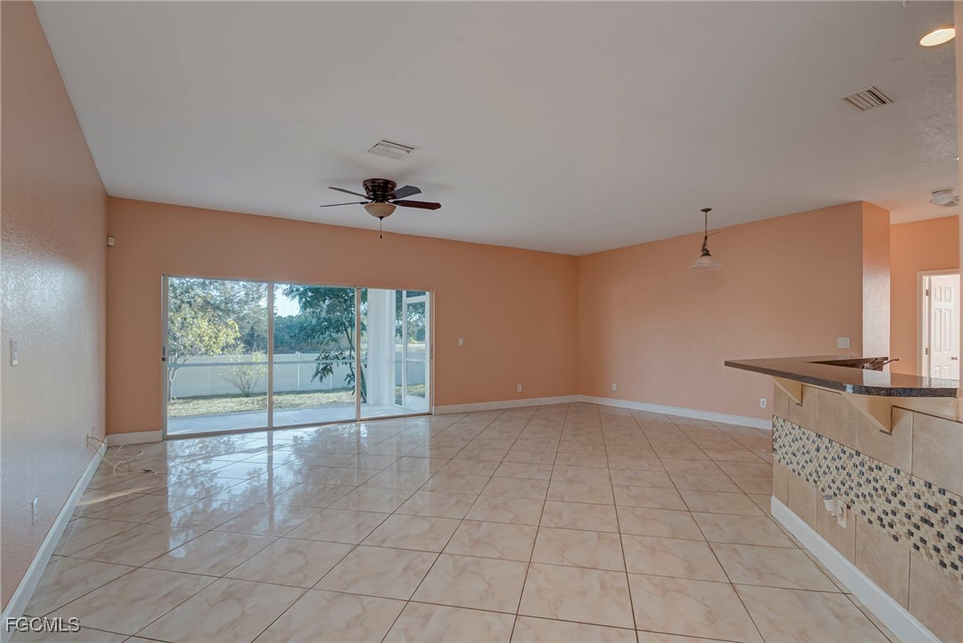 3605 17th Street West Lehigh Acres, FL 33971 - Photo 7 of 27 a view of an empty room with a window