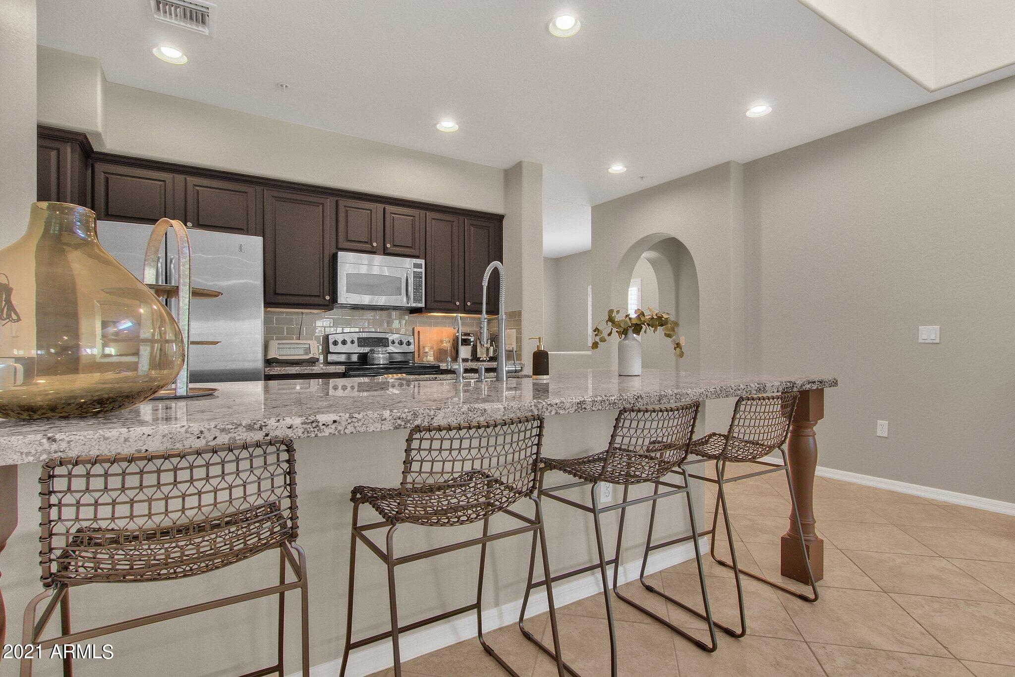 3935 East Rough Rider Road, Unit 1102 Phoenix, AZ 85050 - Photo 1 of 71 10