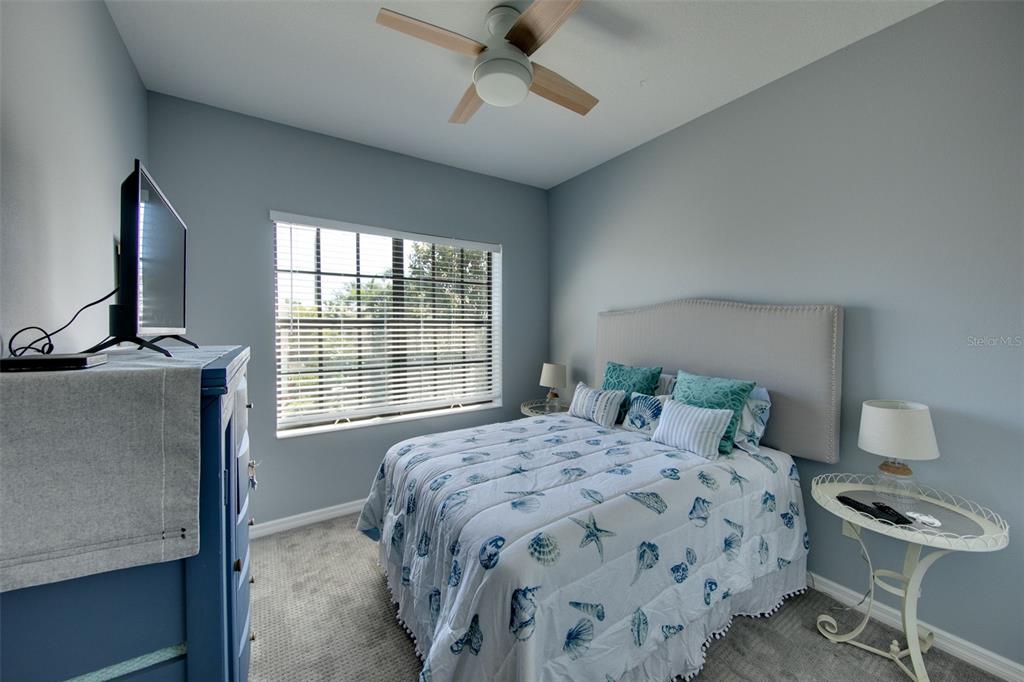 4026 Overture Circle Bradenton, FL 34209 - Photo 14 of 26 a bedroom with a bed and a window