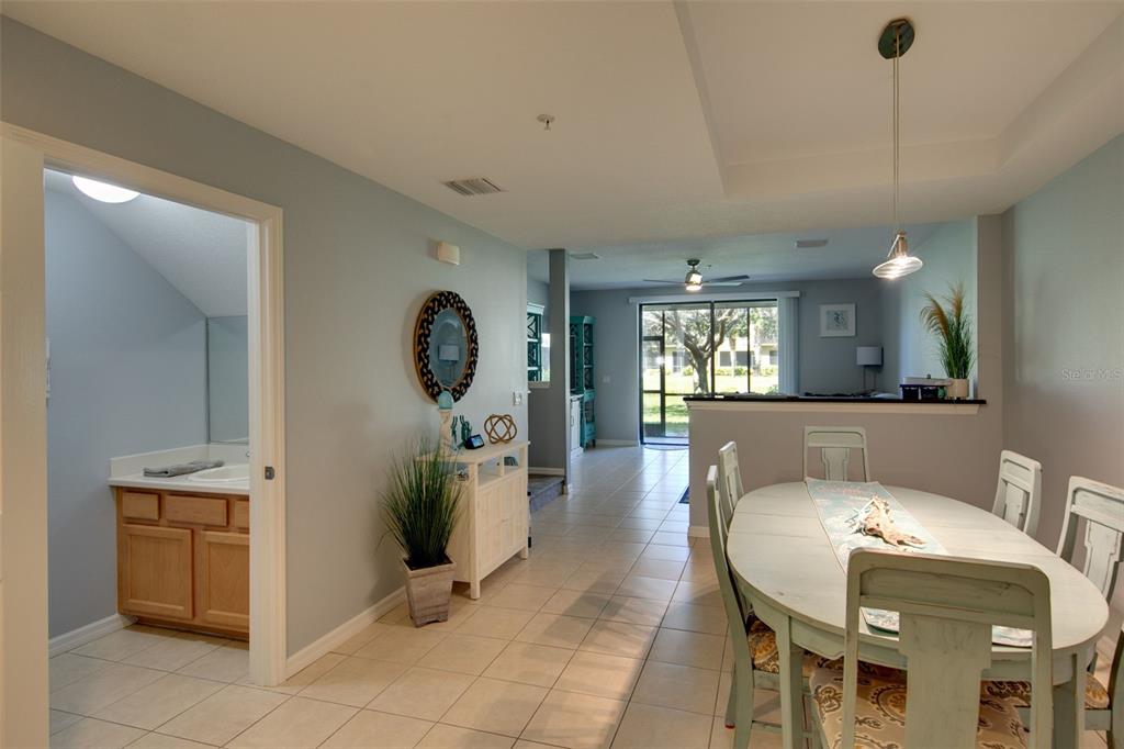 4026 Overture Circle Bradenton, FL 34209 - Photo 4 of 26 a view of a dining room with furniture