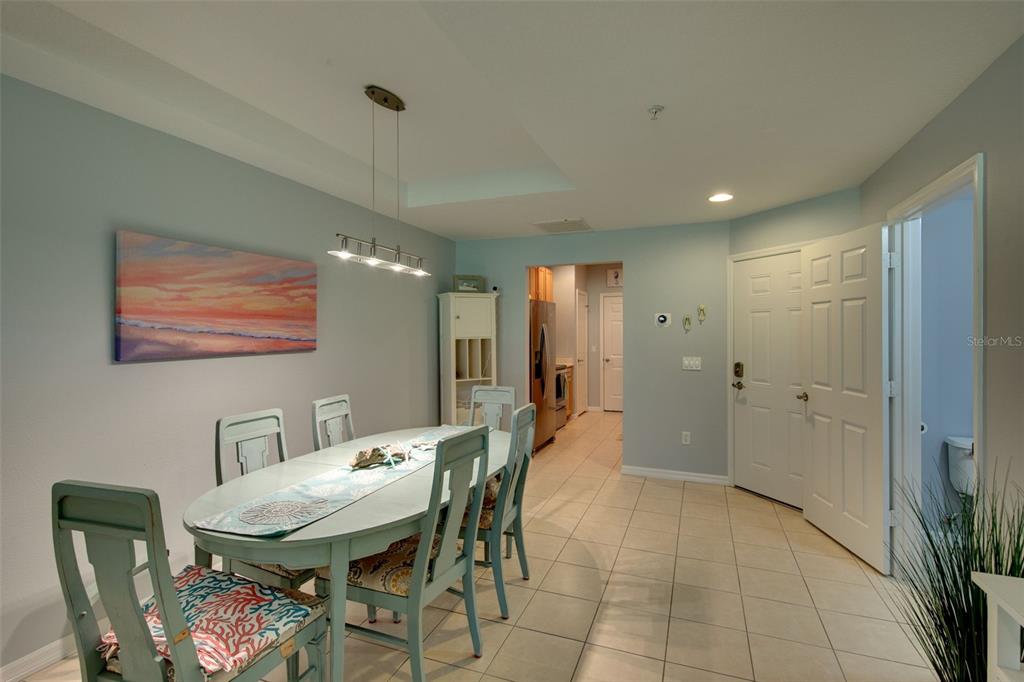 4026 Overture Circle Bradenton, FL 34209 - Photo 5 of 26 a dining room with furniture and window