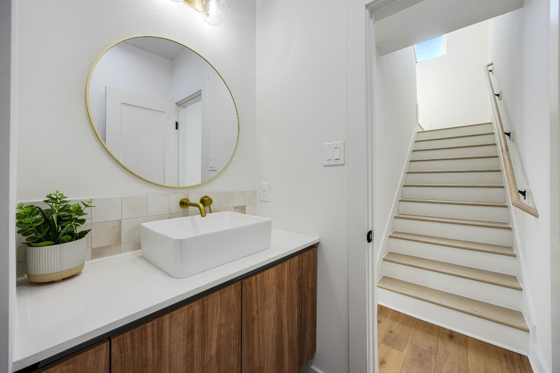 303 Marcella Street, Unit P Houston, TX 77091 - Photo 10 of 26 Half bathroom located on the second floor