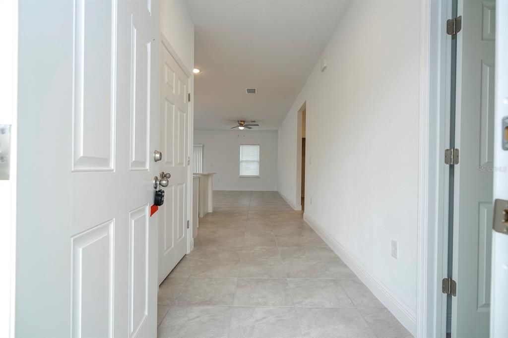 8 Locust Run Ocala, FL 34472 - Photo 3 of 71 a view of a hallway with a white walls