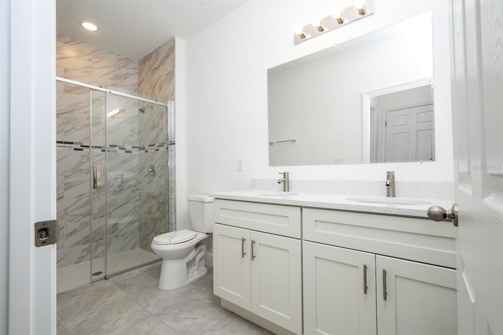 8 Locust Run Ocala, FL 34472 - Photo 39 of 71 a bathroom with a sink toilet and shower