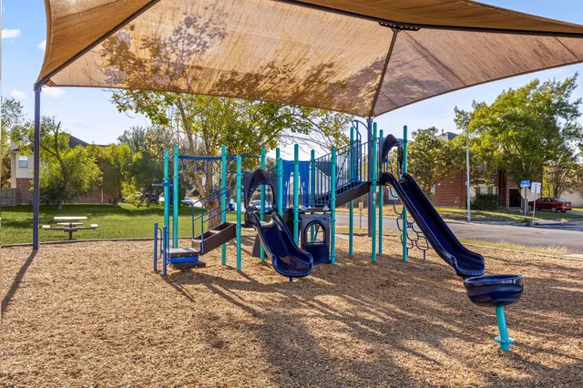 a view of a park with a slide