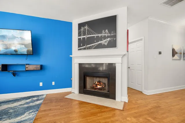 a living room with a fireplace