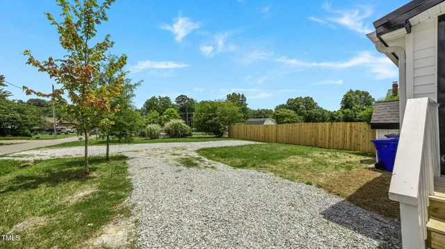 a view of backyard with green space