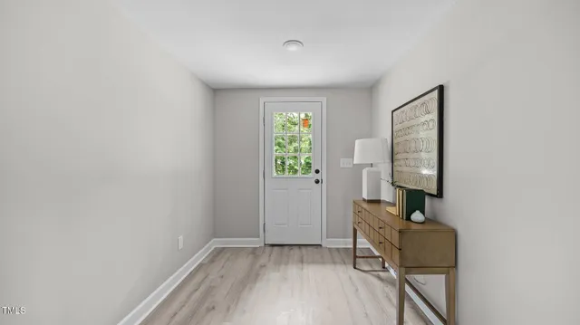 a view of room with window and workspace