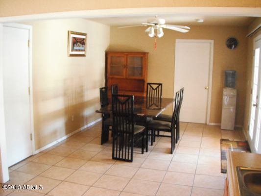 4221 East Vineyard Road Phoenix, AZ 85042 - Photo 3 of 8 FAMILY ROOM