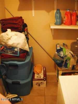 4221 East Vineyard Road Phoenix, AZ 85042 - Photo 8 of 8 INSIDE LAUNDRY ROOM OFF FAMILY ROOM