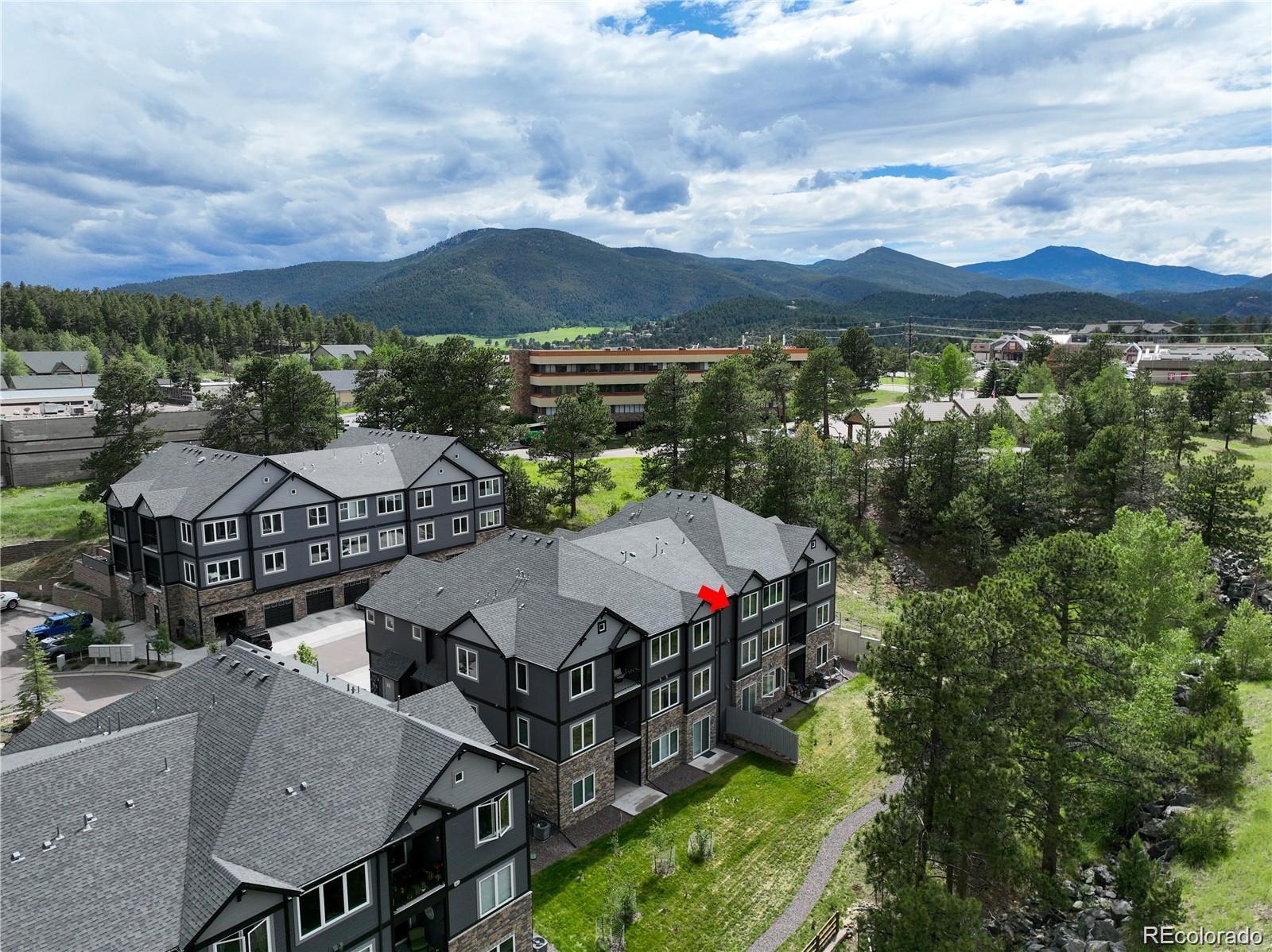 31191 Black Eagle Drive, Unit 301 Evergreen, CO 80439 - Photo 1 of 35 an aerial view of a house