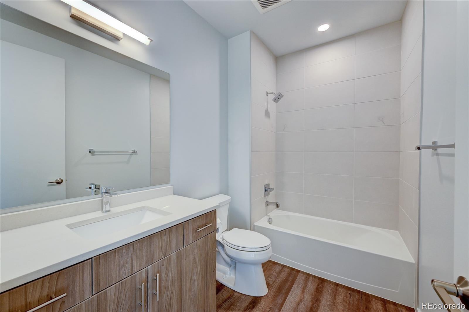 31191 Black Eagle Drive, Unit 301 Evergreen, CO 80439 - Photo 22 of 35 a bathroom with a sink a toilet and shower