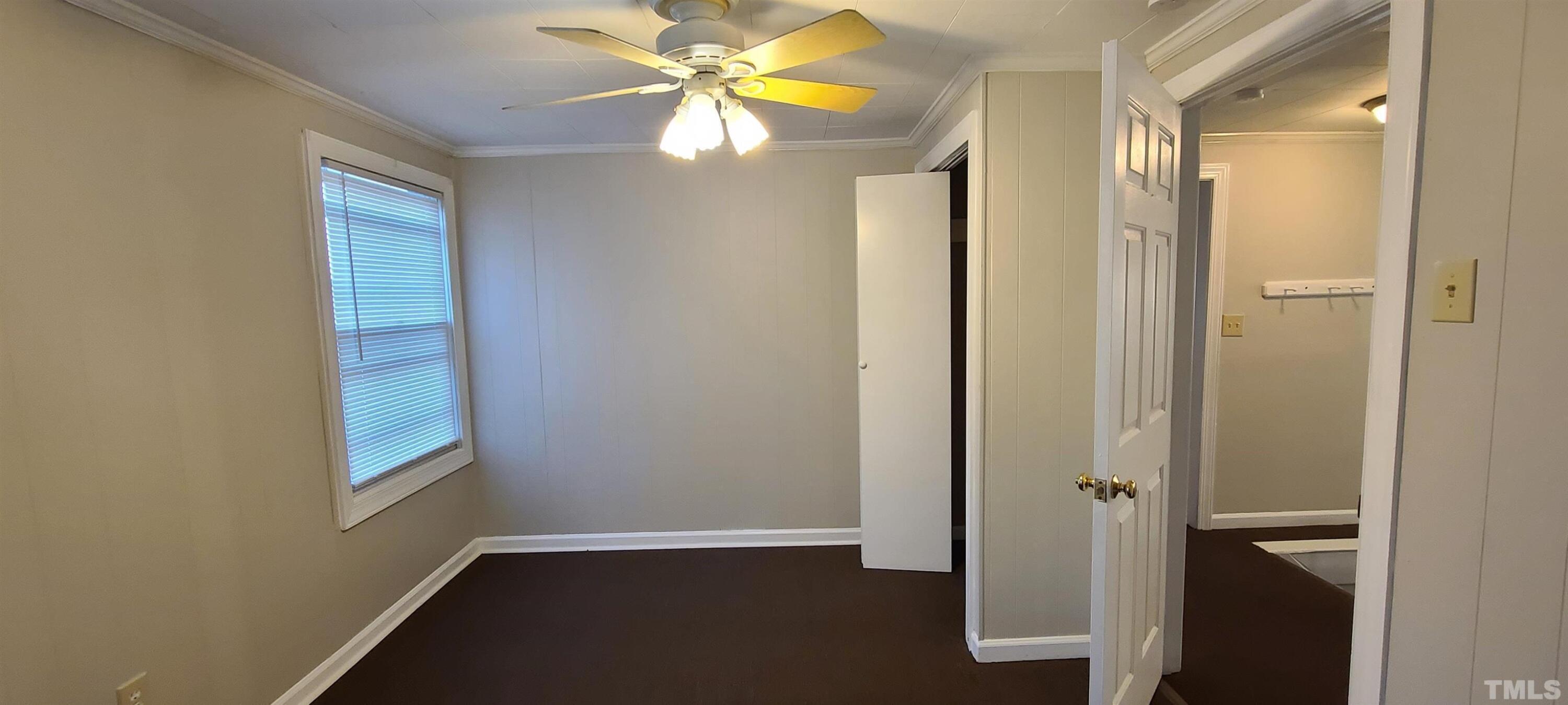 318 Powell Drive, Unit 2 Raleigh, NC 27606 - Photo 4 of 10 a view of an entryway with wooden floor