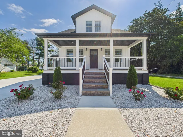a view of a patio with wooden floor