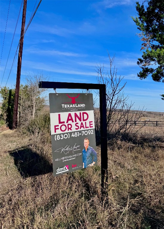 Tbd Tract H Tbd Tract H Scull Road San Marcos, TX 78666 - Photo 12 of 13 a sign that is on the side of the road