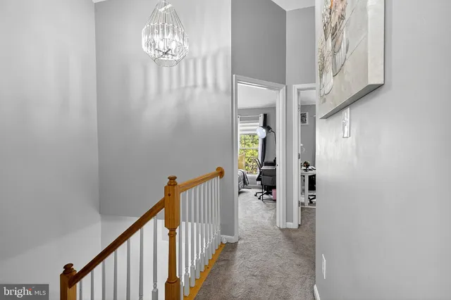 a view of a hallway view with staircase