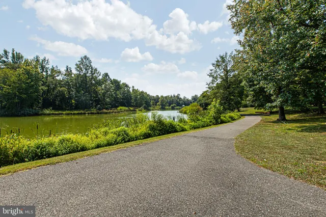 a view of a lake with a big yard