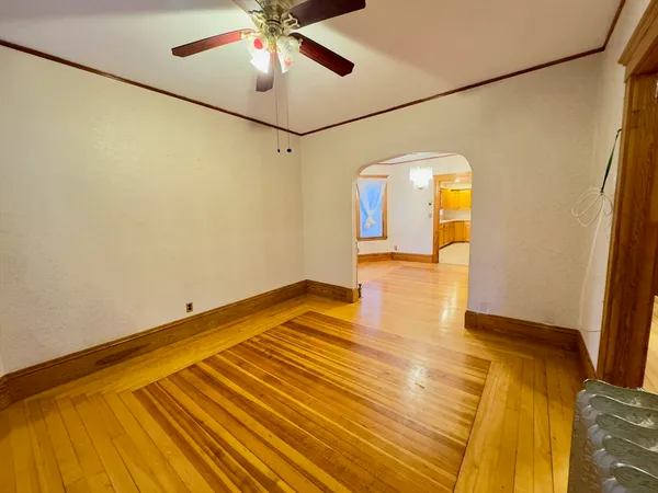 a view of a room with wooden floor and iron walls