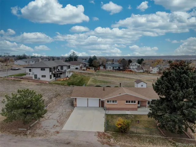 a view of houses with outdoor space