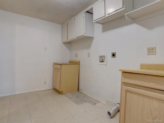 an empty room with a bathroom