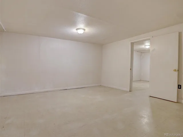 an empty room with a workbench