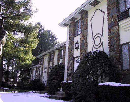 54 Hope Street, Unit U Stamford, CT 06906 - Photo 1 of 1 a view of a house with a yard