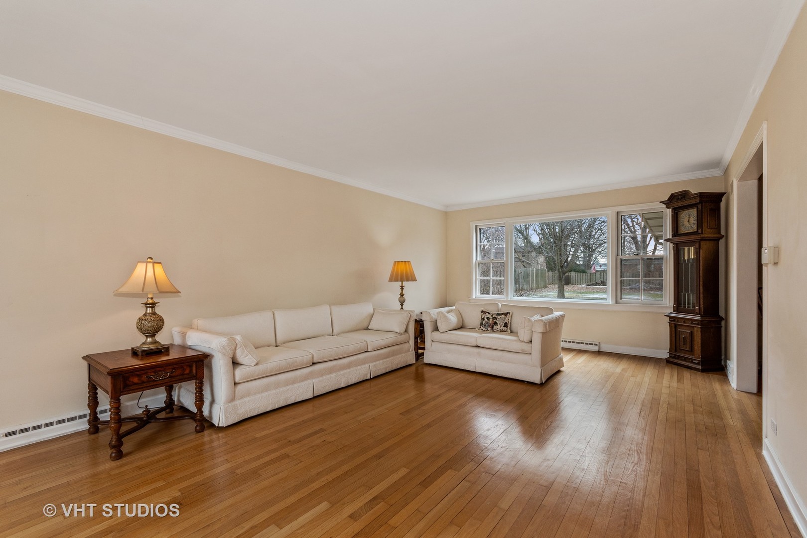 22W679 Poplar Road Glen Ellyn, IL 60137 - Photo 11 of 23 a living room with furniture and a large window