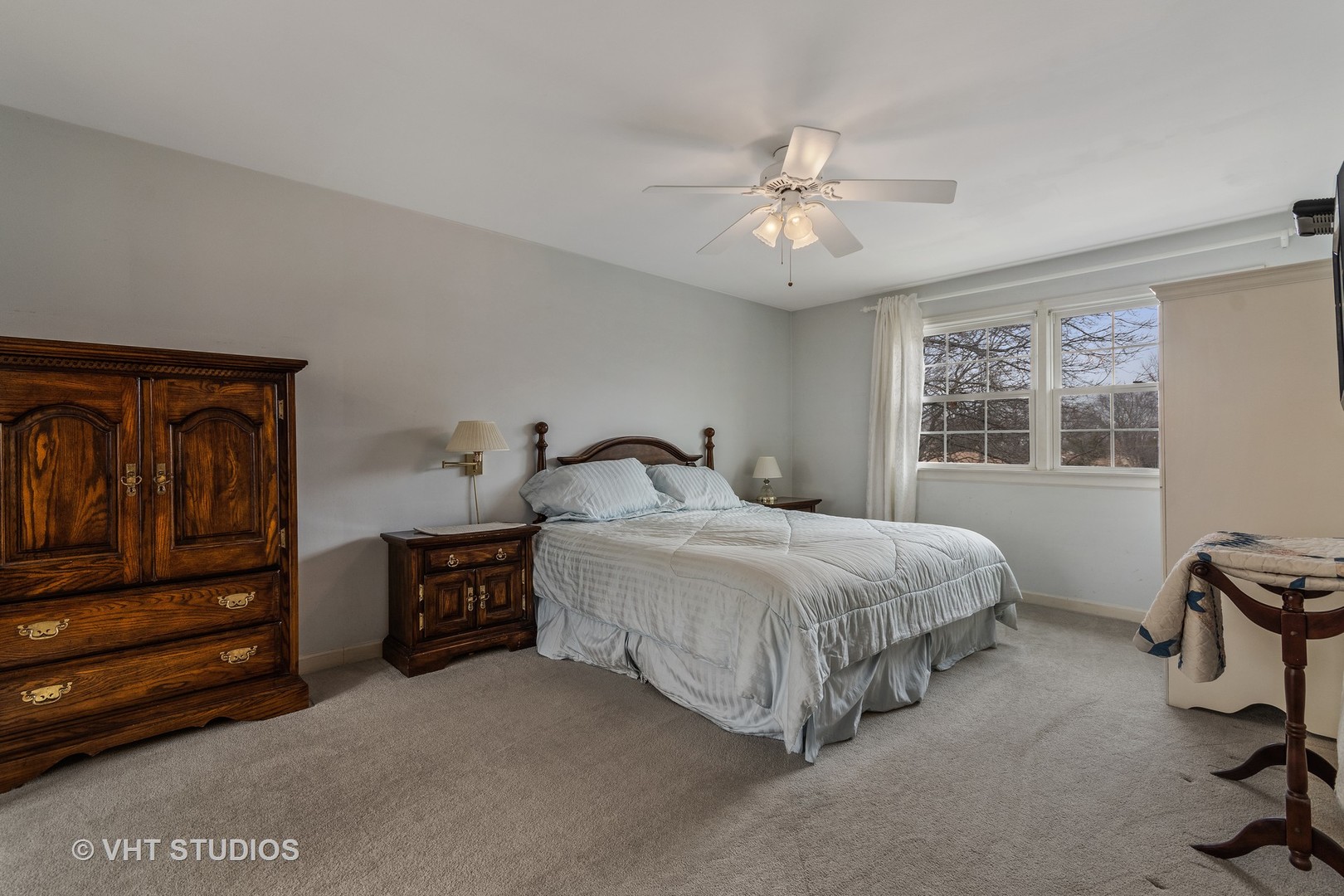 22W679 Poplar Road Glen Ellyn, IL 60137 - Photo 13 of 23 a bedroom with a bed and a window