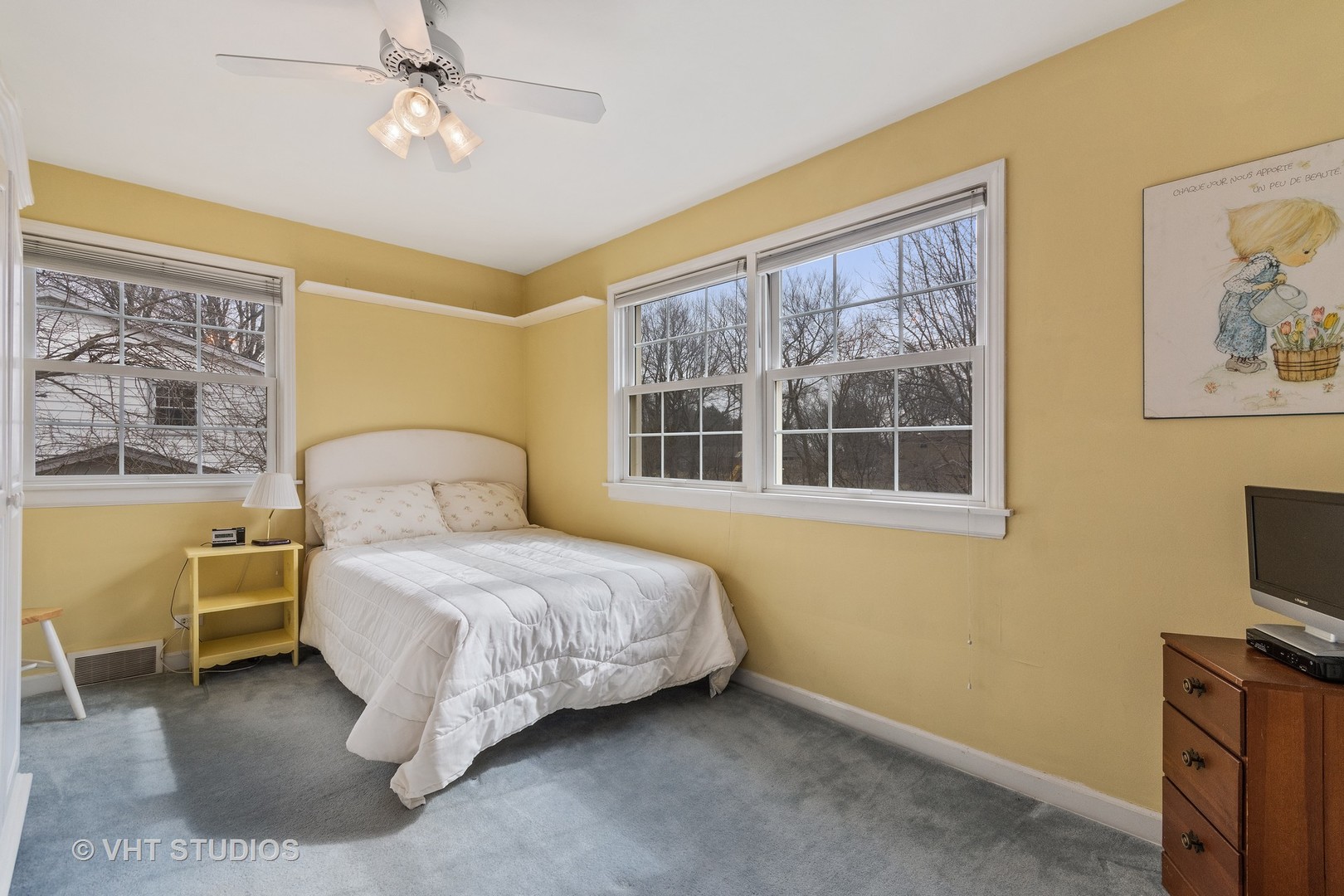 22W679 Poplar Road Glen Ellyn, IL 60137 - Photo 16 of 23 a bedroom with a bed dresser and a window