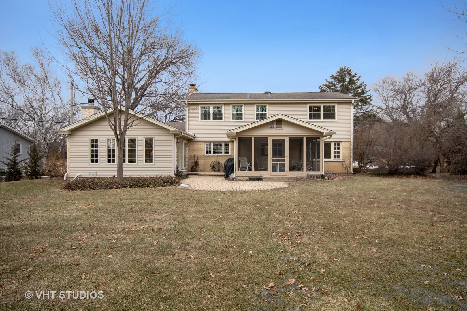 22W679 Poplar Road Glen Ellyn, IL 60137 - Photo 21 of 23 a front view of a house with a garden