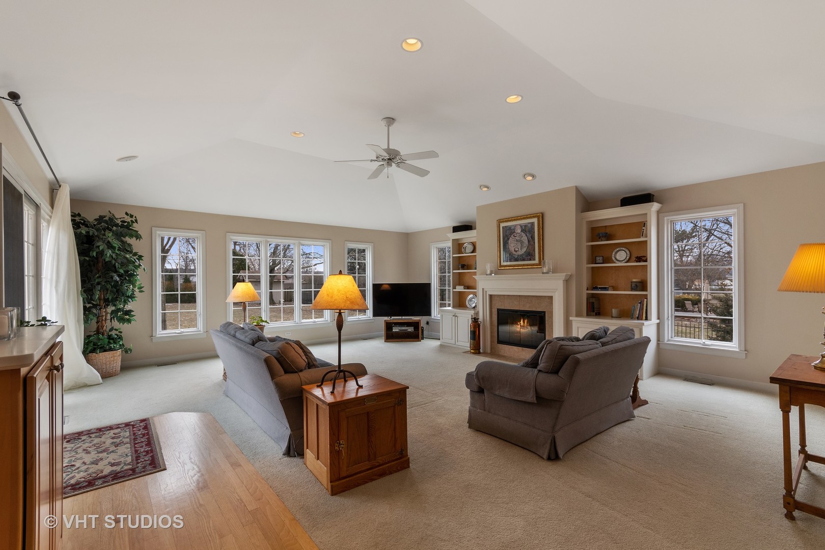 22W679 Poplar Road Glen Ellyn, IL 60137 - Photo 4 of 23 a living room with furniture fireplace and flat screen tv