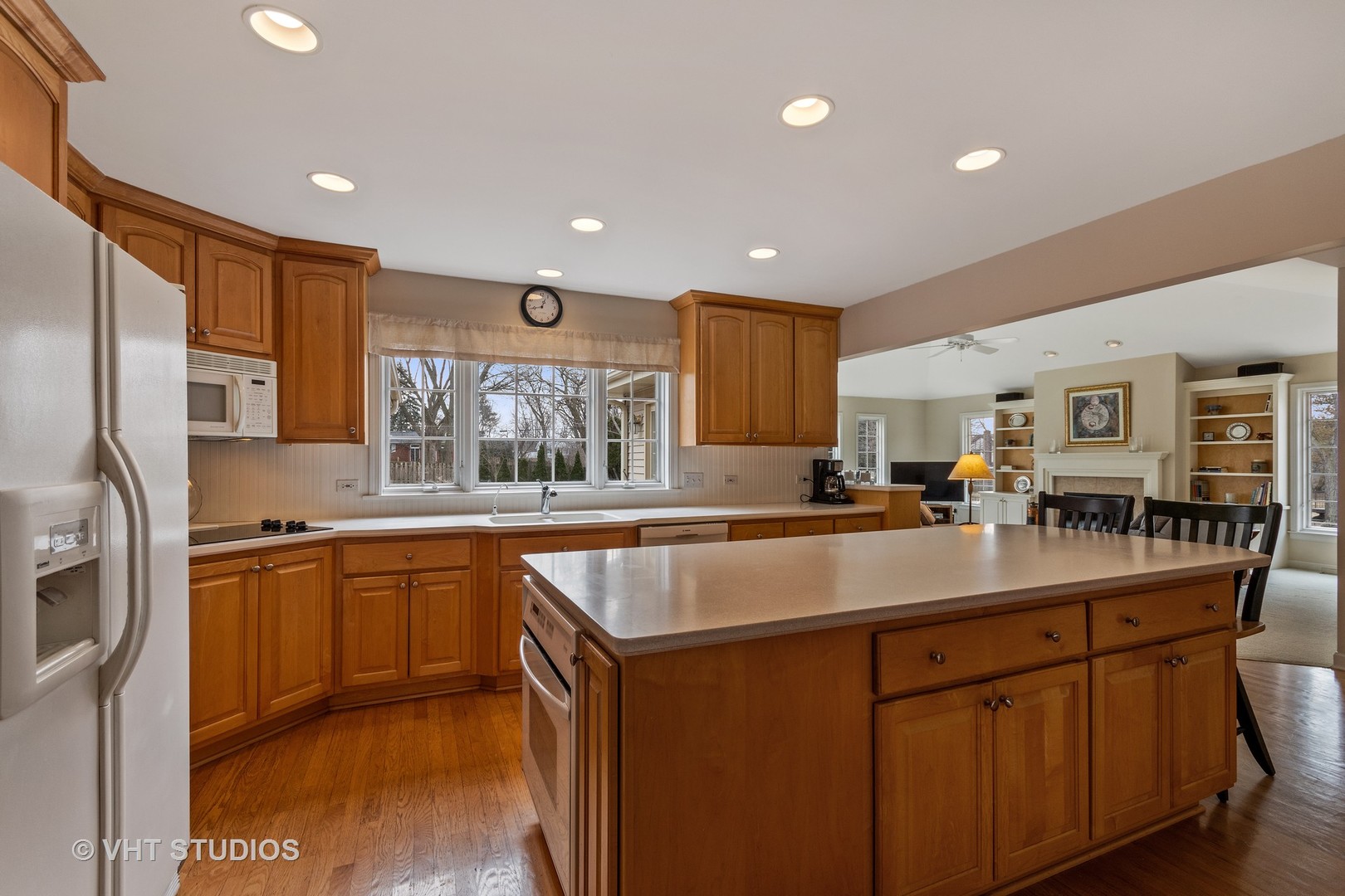 22W679 Poplar Road Glen Ellyn, IL 60137 - Photo 6 of 23 a kitchen with stainless steel appliances granite countertop sink stove and refrigerator