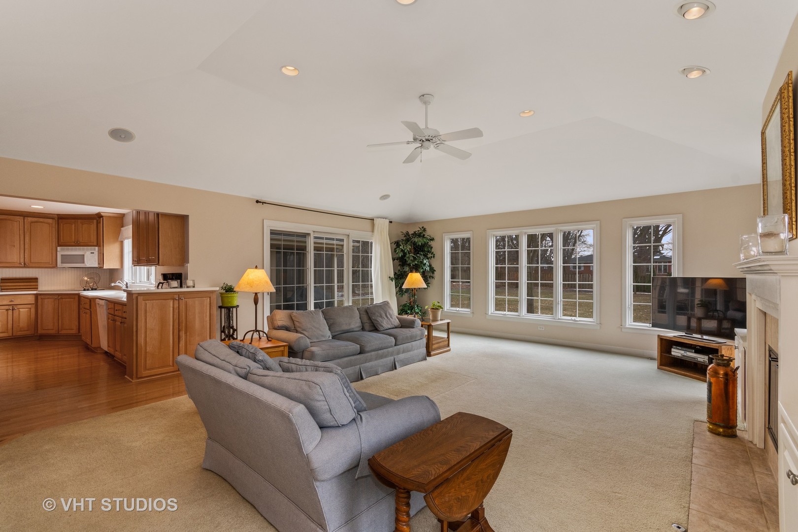22W679 Poplar Road Glen Ellyn, IL 60137 - Photo 7 of 23 a living room with furniture and a flat screen tv