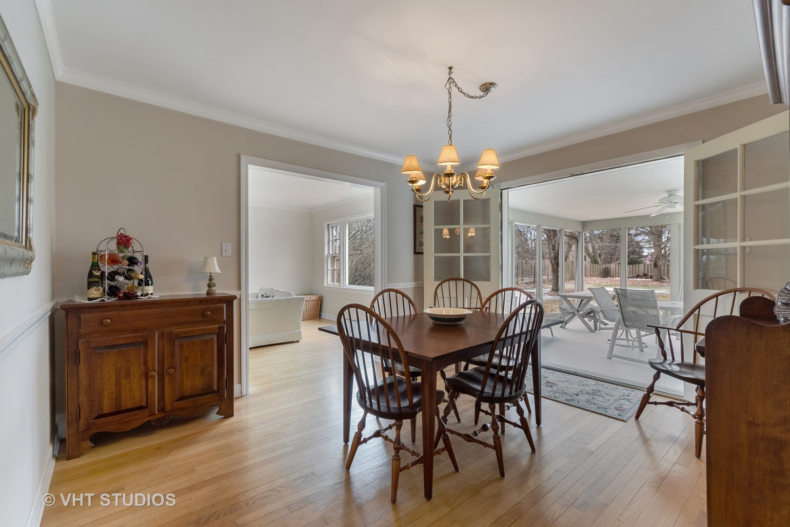 22W679 Poplar Road Glen Ellyn, IL 60137 - Photo 9 of 23 a view of a dining room with furniture wooden floor and chandelier