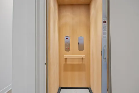 a bathroom with a glass door