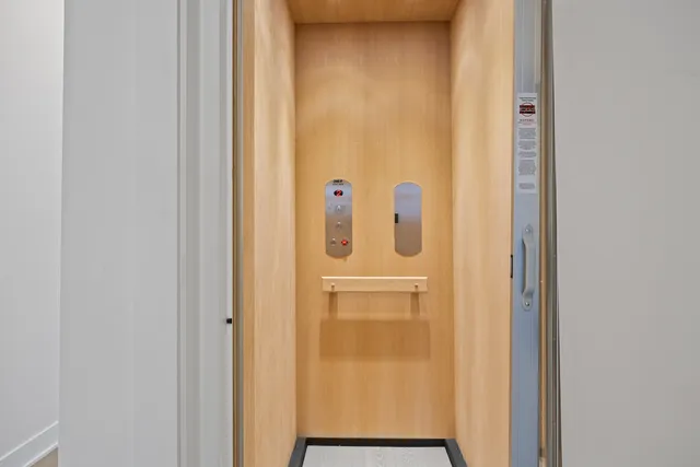 a bathroom with a glass door