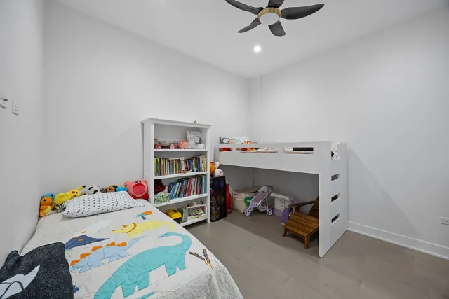 a bedroom with a bed and closet