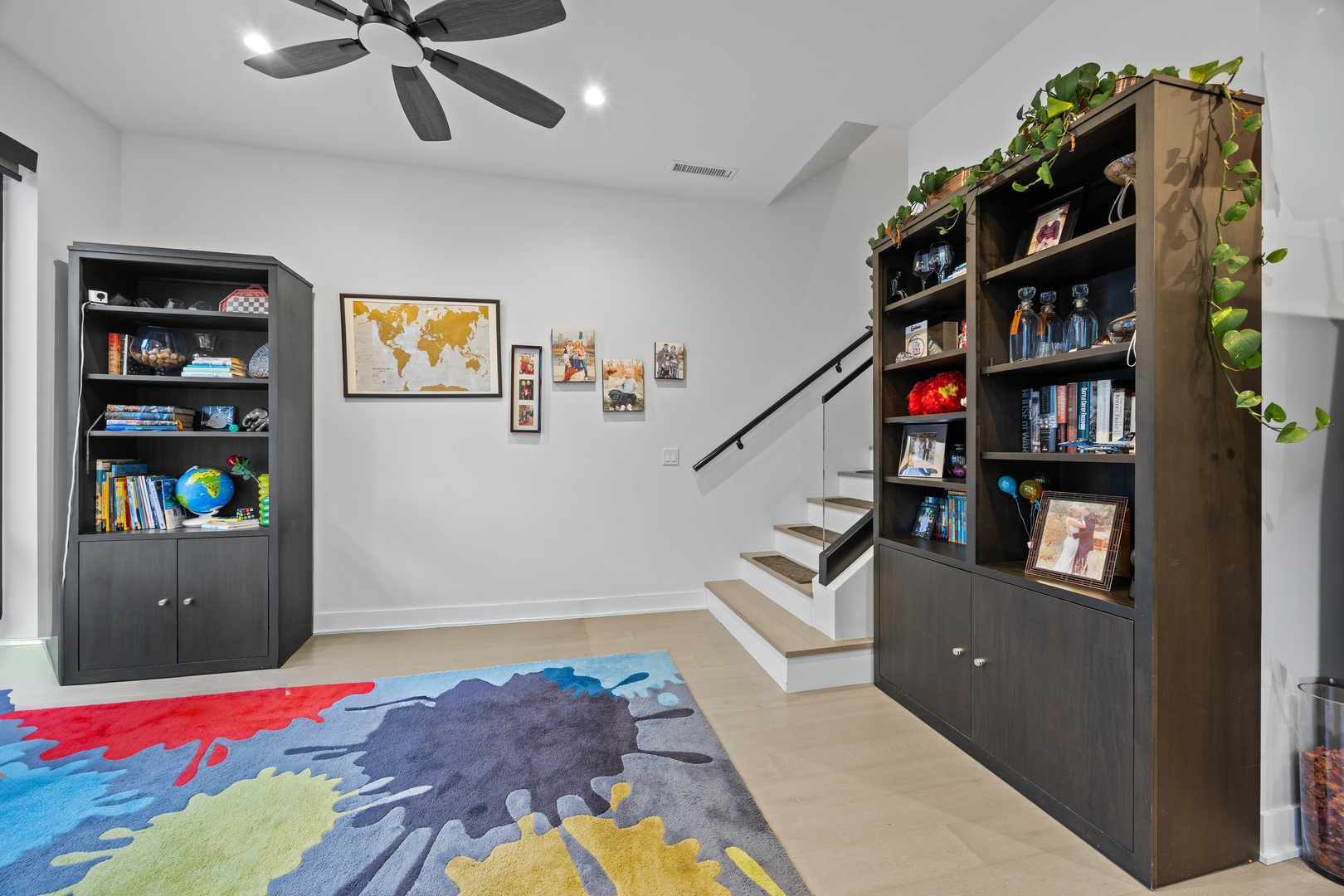 305 South Racine Avenue, Unit PHD Chicago, IL 60607 - Photo 28 of 41 a bedroom with furniture and book shelf