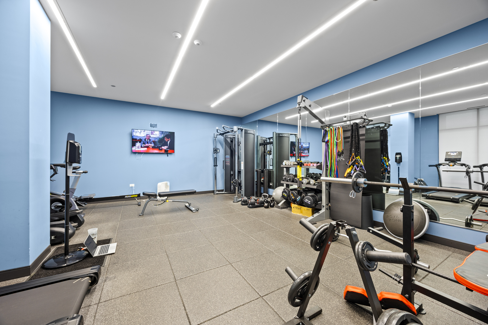 305 South Racine Avenue, Unit PHD Chicago, IL 60607 - Photo 39 of 41 a view of a room with gym equipment