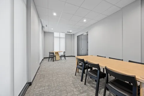 a view of parking garage with cars