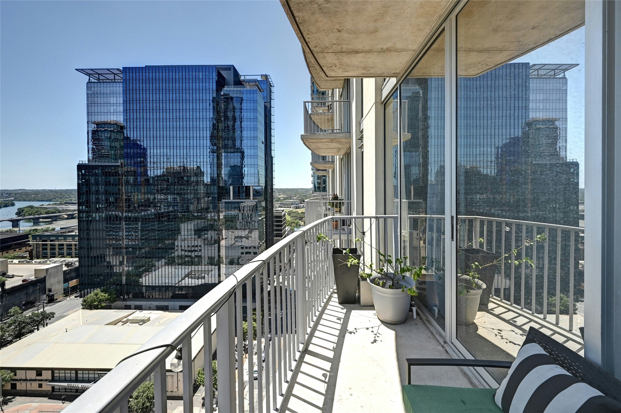 360 Nueces Street, Unit 1809 Austin, TX 78701 - Photo 22 of 25 Private balcony featuring a concrete floor and a metal railing