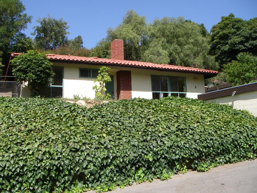 507 Conejo Road Santa Barbara, CA 93103 - Photo 1 of 2 a front view of a house with a yard