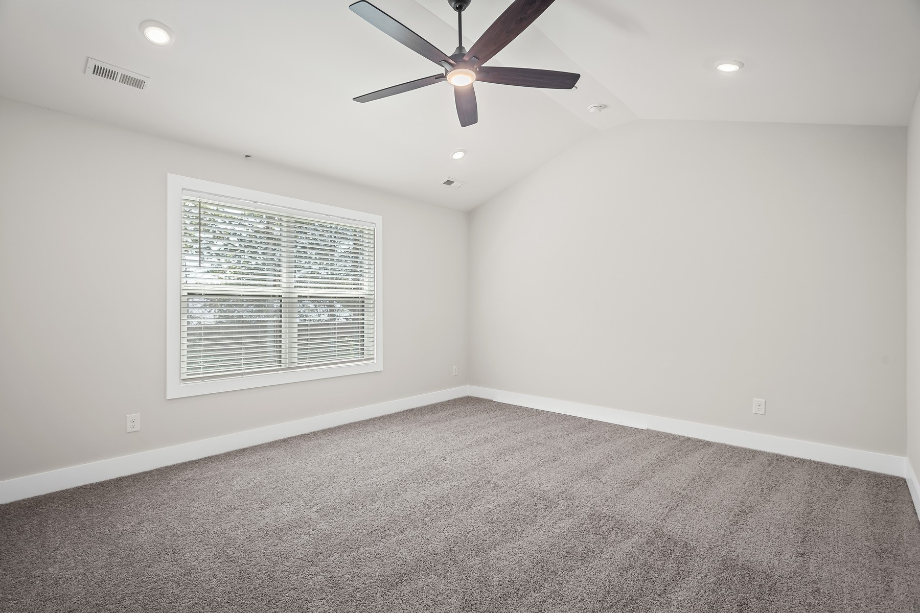 4015 Norman Drive Spring Hill, TN 37174 - Photo 7 of 11 an empty room with a window and a fan