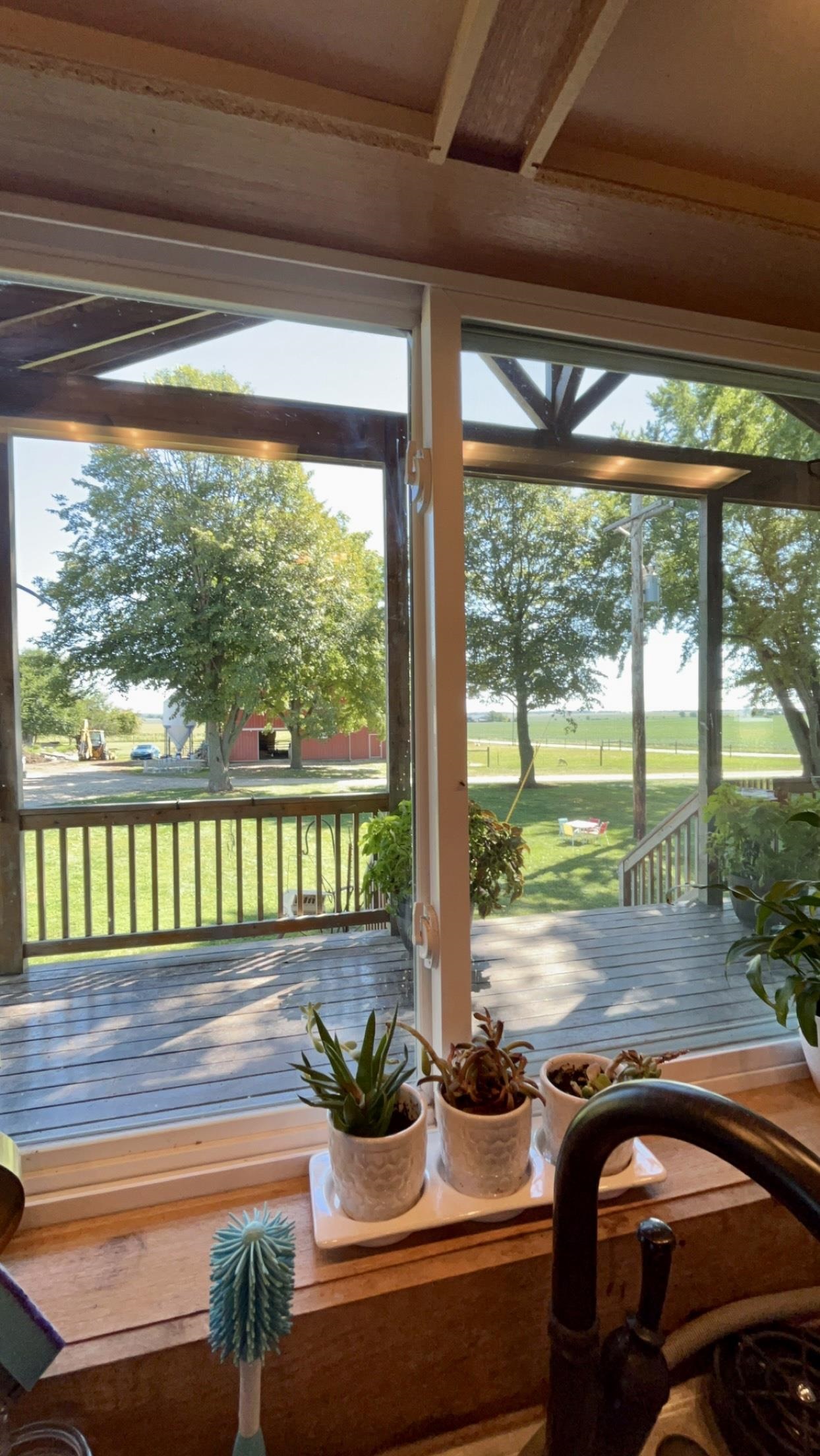 6070 Dewane Road Belvidere, IL 61008 - Photo 11 of 30 a room with furniture and a potted plant