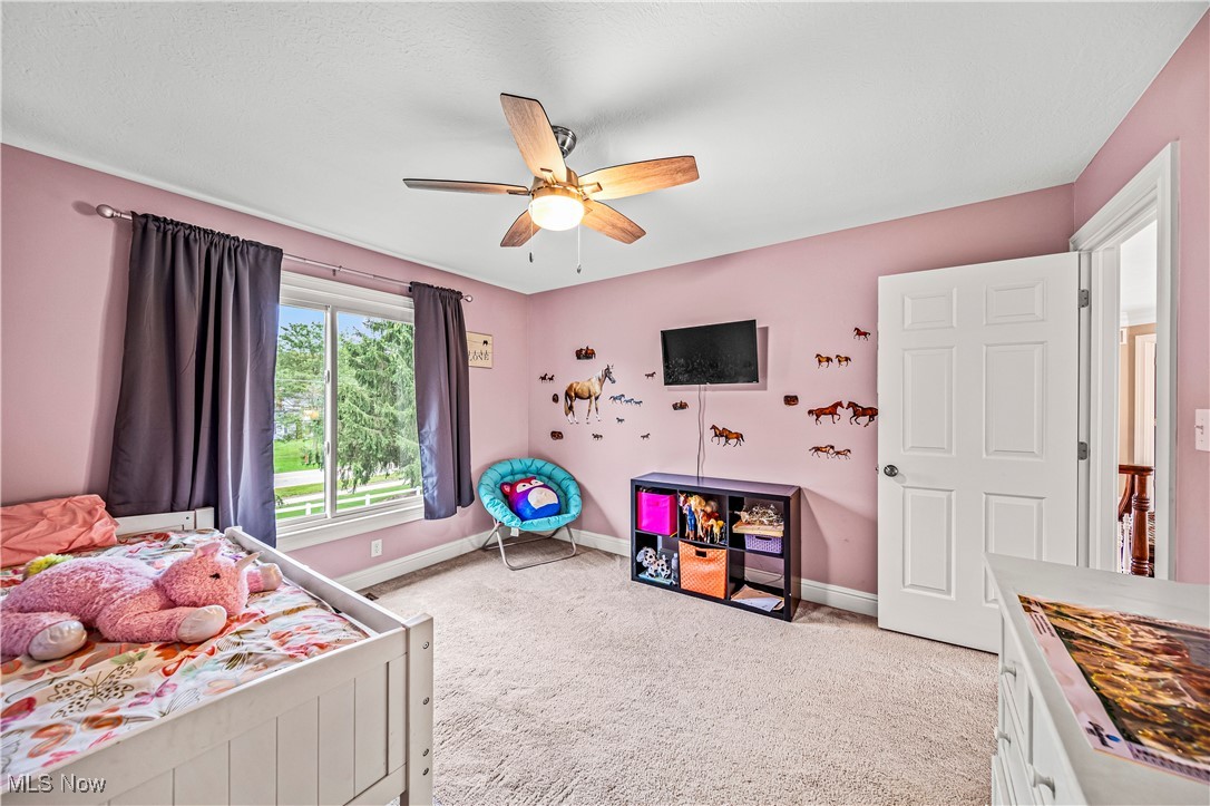 1879 Middleton Road Hudson, OH 44236 - Photo 25 of 50 Carpeted bedroom with ceiling fan
