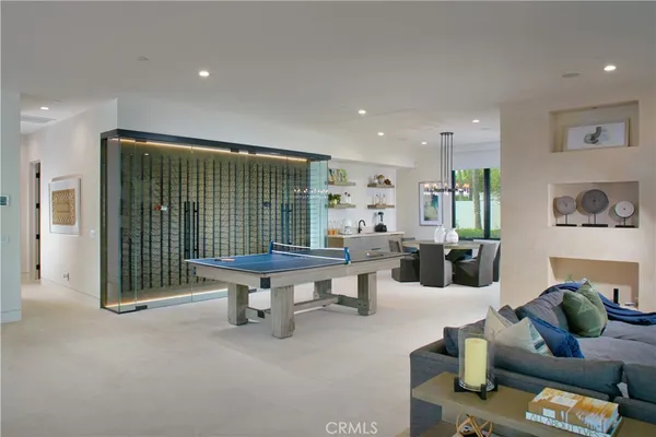 a living room with furniture and a gate