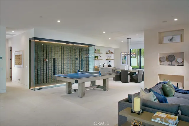 a living room with furniture and a gate