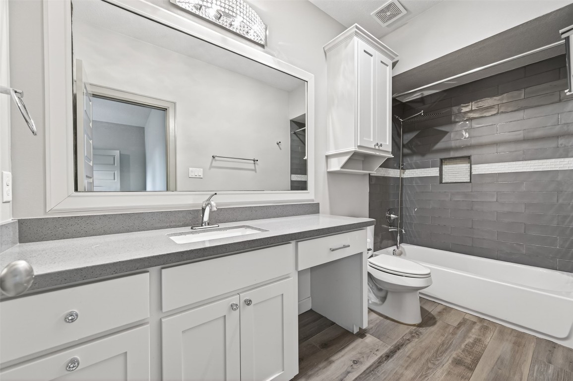 12379 Pebble View Drive Conroe, TX 77304 - Photo 38 of 49 a bathroom with a sink and a mirror