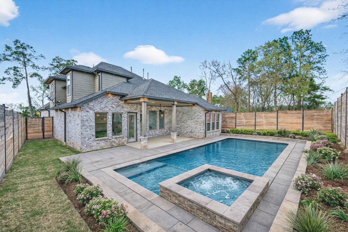 12379 Pebble View Drive Conroe, TX 77304 - Photo 42 of 49 a view of a house with pool